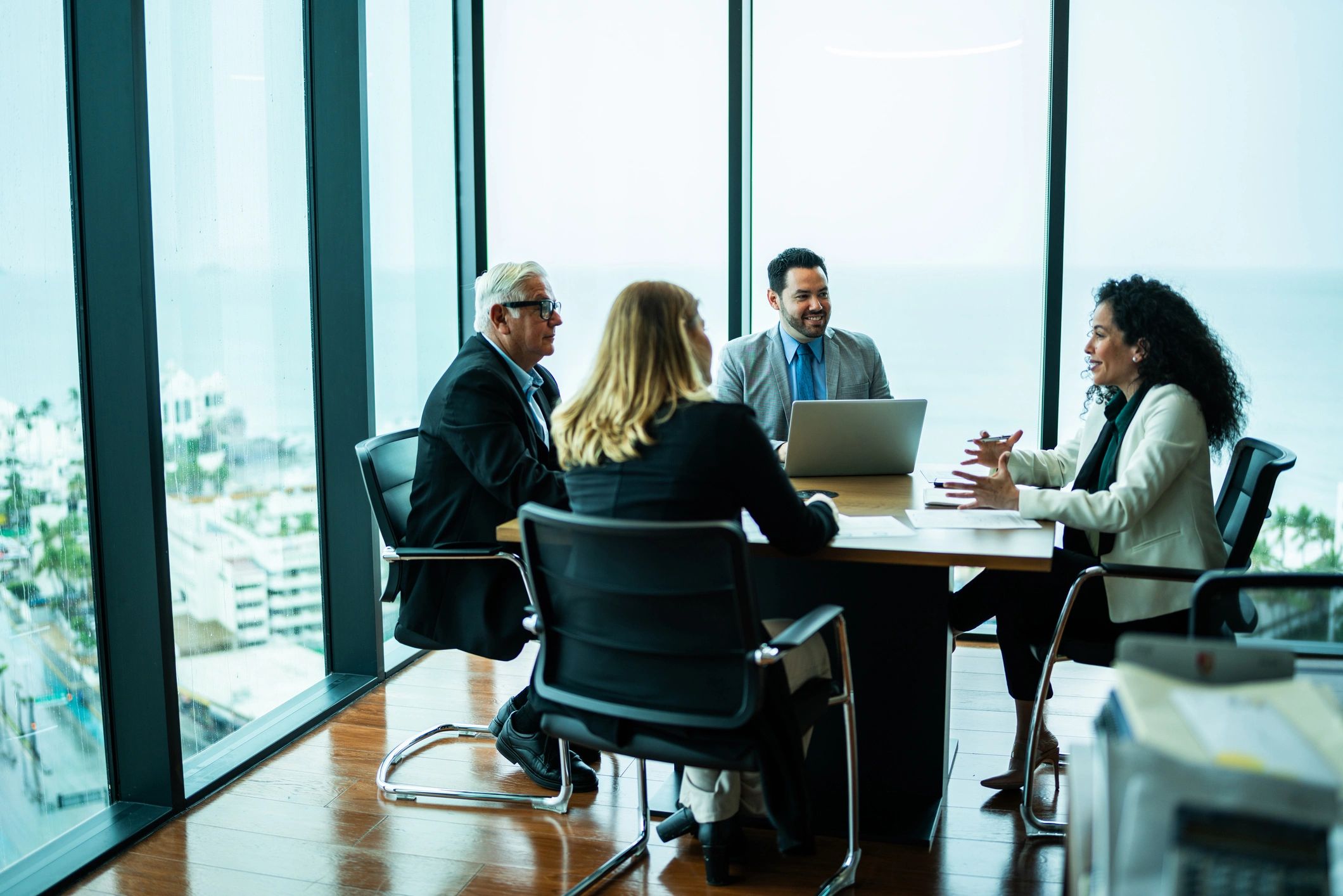 Executives in a boardroom discussion representing interim leadership